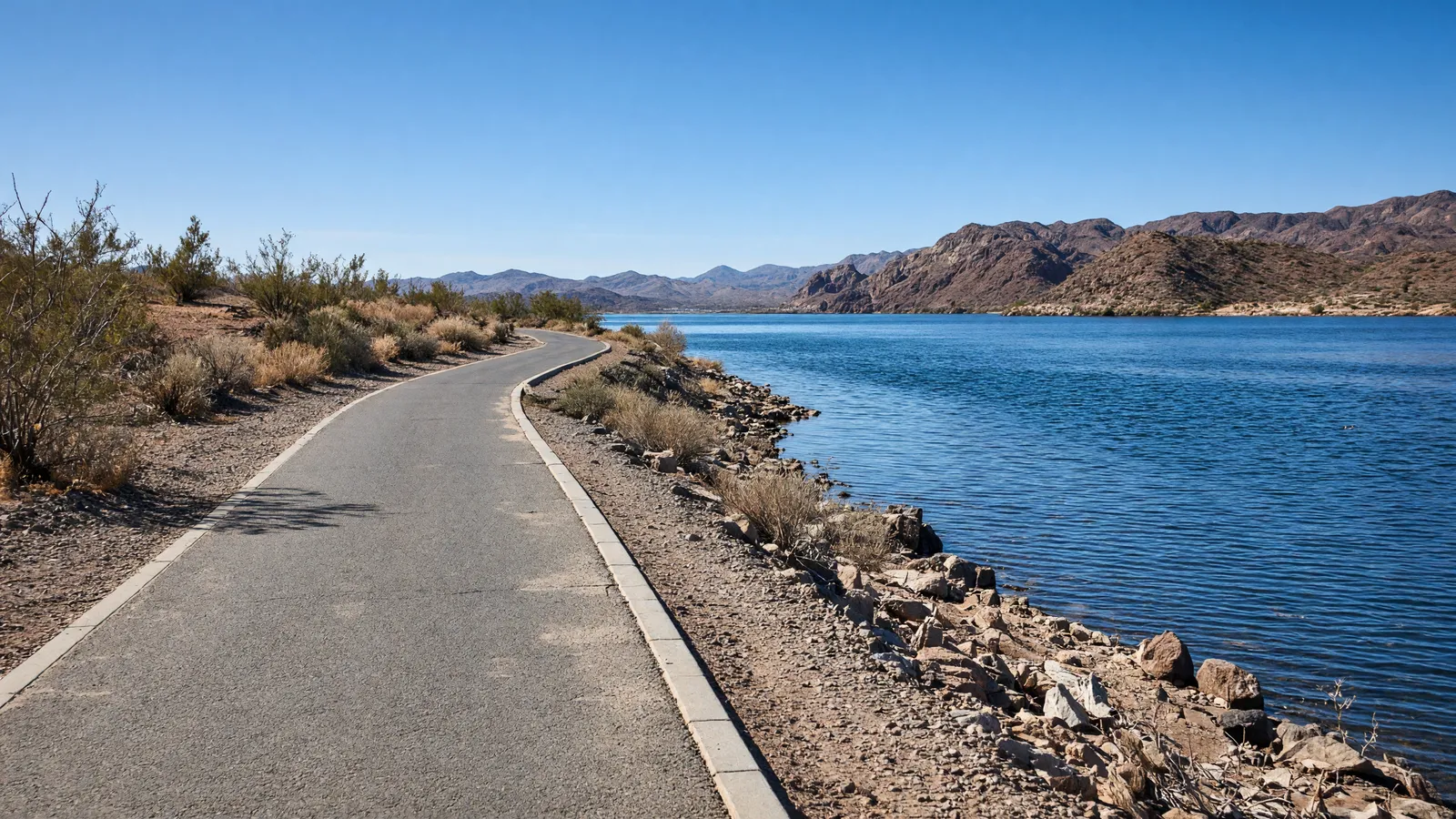 Empty paved Island Trail along the Colorado River in Lake Havasu City, Mohave County, Arizona