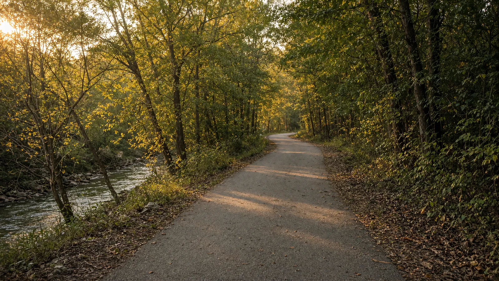 Empty Razorback Regional Greenway paved path along Scull Creek, Washington County, Arkansas