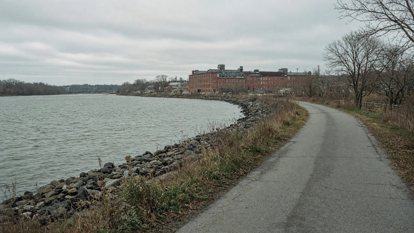 Empty Penobscot River waterfront path near Bangor, Maine