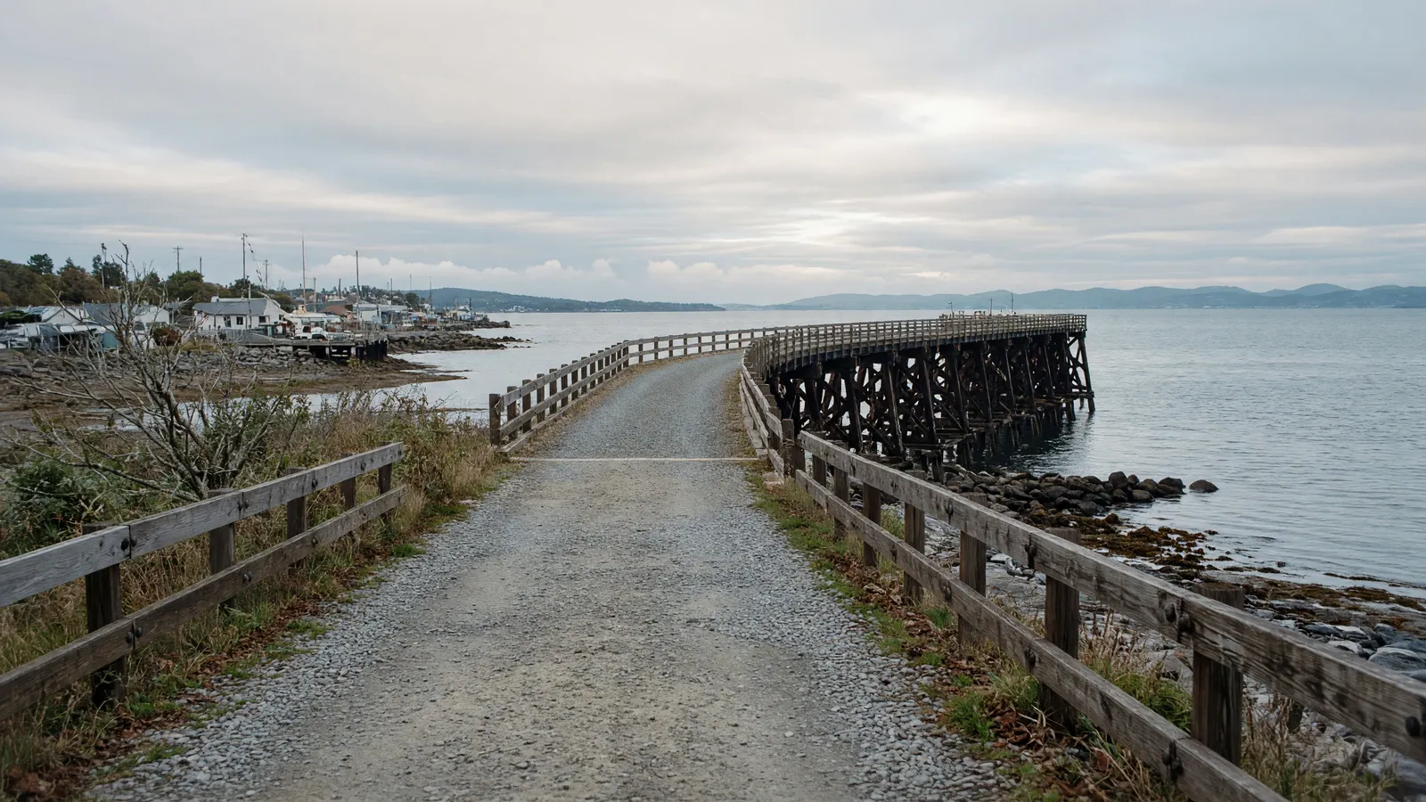 Empty Belfast Harbor rail-trail trestle approach, Maine