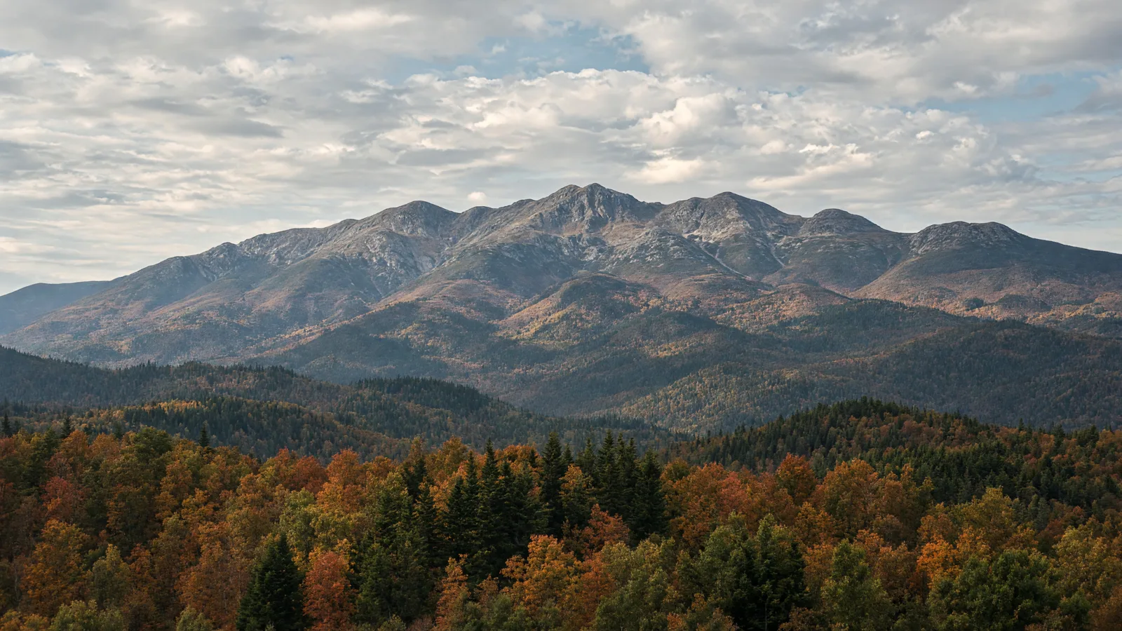 White Mountains Presidential Range above autumn forest, New Hampshire