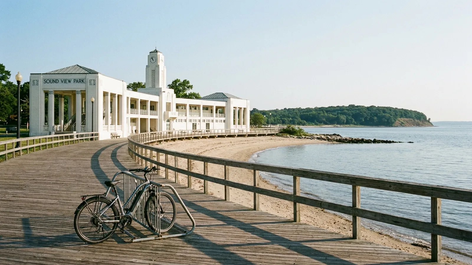 Electric bike parked beside an Art Deco seaside boardwalk park on Long Island Sound in New London Connecticut