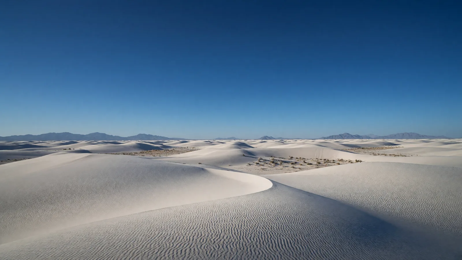 White Sands gypsum dunes under blue sky, New Mexico