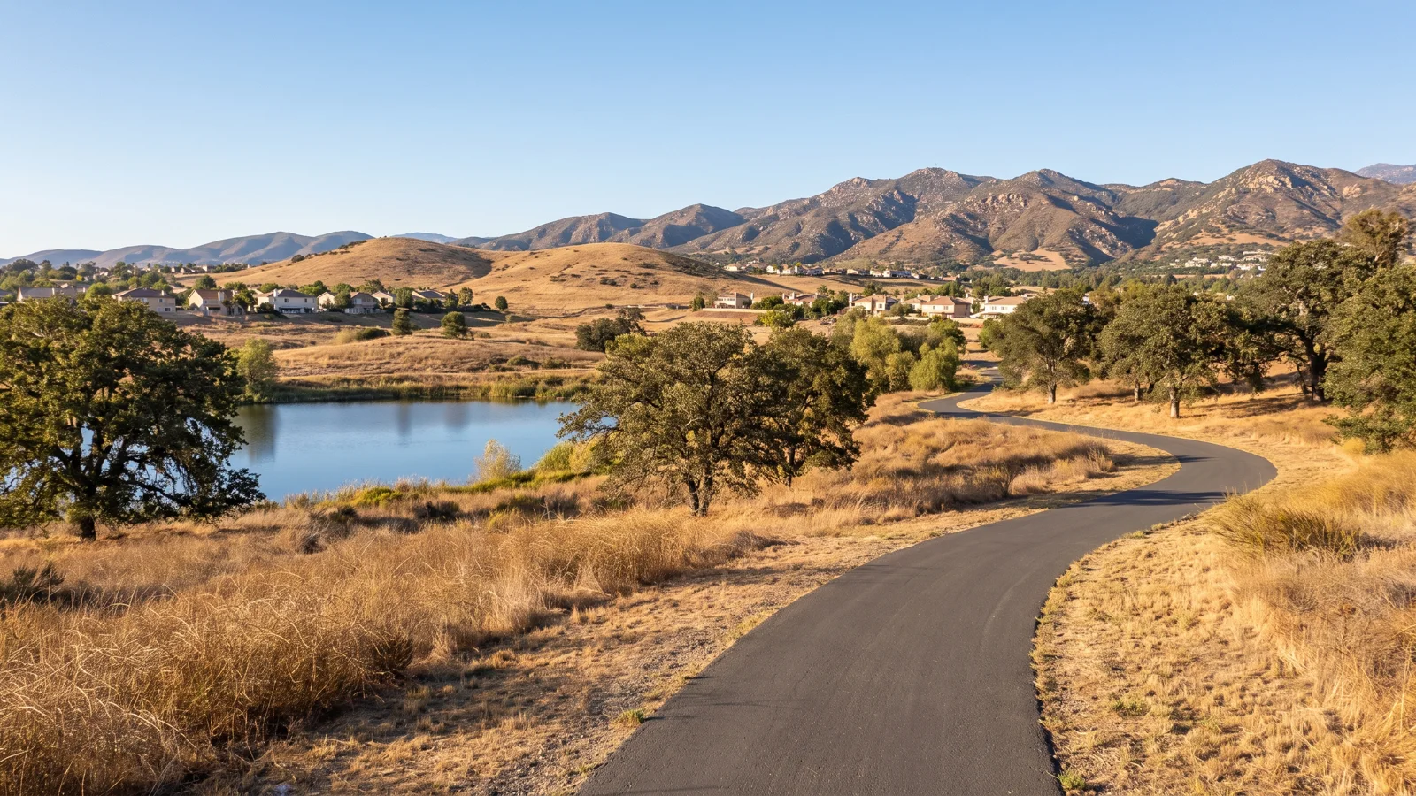 Low-rise San Marcos California valley with hills and inland lake for eBike riders
